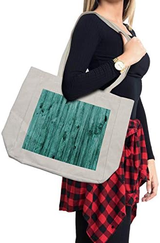 Ambsonne tirkizna torba za kupovinu, zid tirkizne drvene teksture pozadina i antički tisak drvenog namještaja, ekološki prihvatljiva